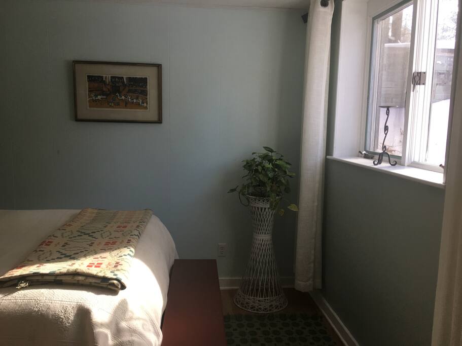 Natural light in all seasons floods the bedroom