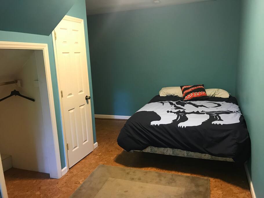 Queen bed in the apartment.