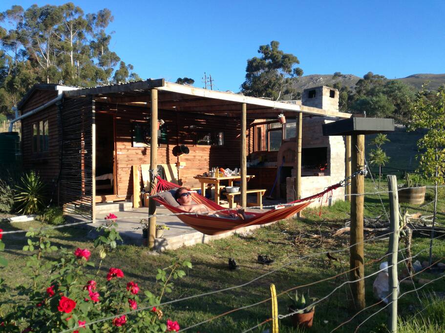 Front view, hammock, braai area and pizza oven on the terrace