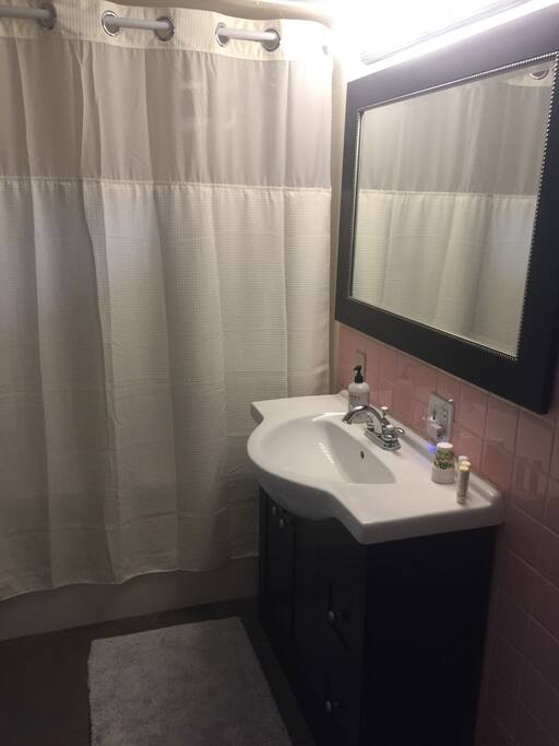 Full bathroom with jetted tub