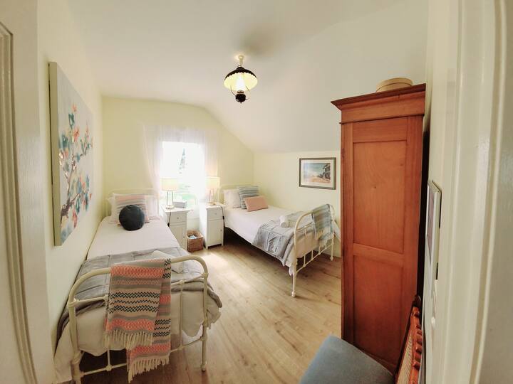 Bedroom 2: two single beds.
Singles may be configured into a king option upon request at time of booking.  