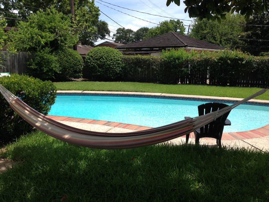 Relax in a hammock under the shade of a Magnolia tree and take a swim to cool off.