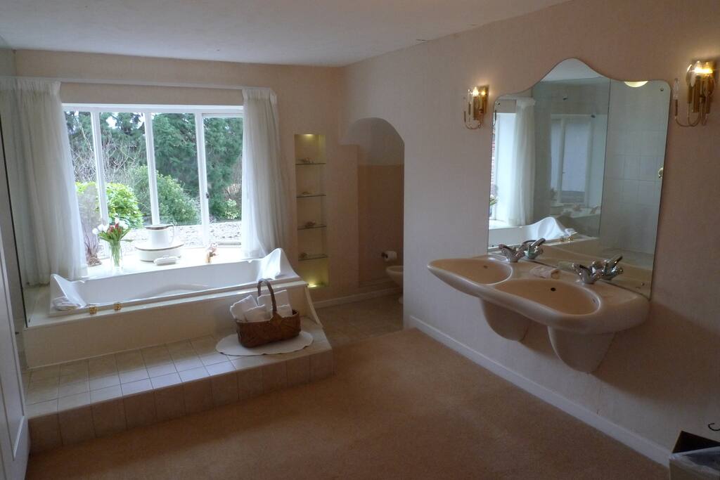 Master bedroom bathroom, has a unique double ended bath.