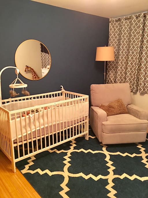 Kids room with crib and air mattress for adults if needed.