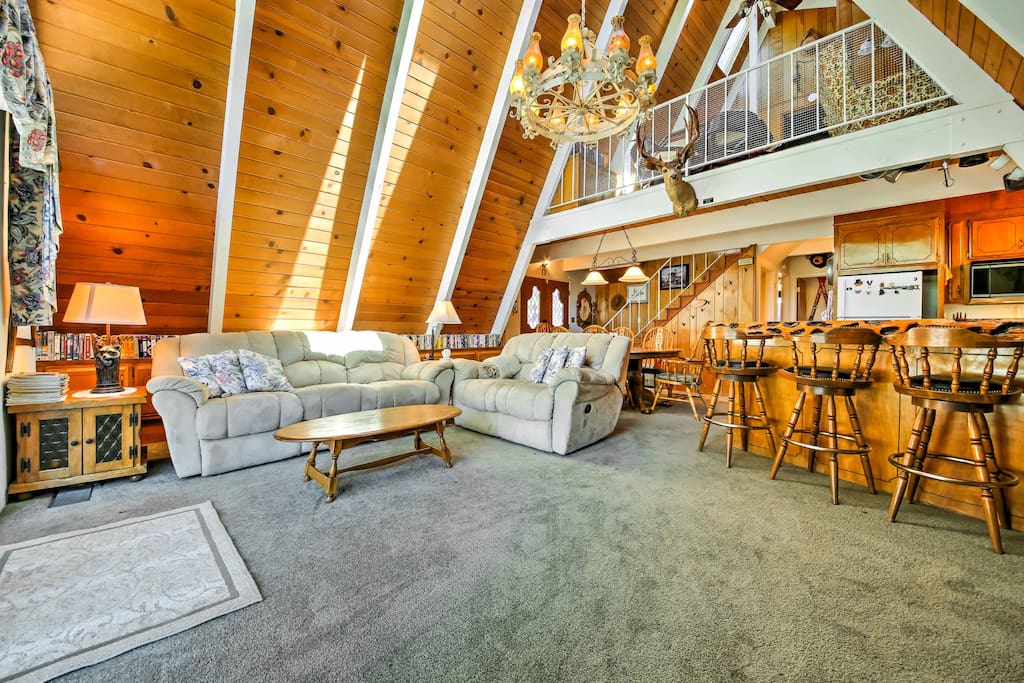 Wood paneled walls and ceilings give the home a rustic feel.