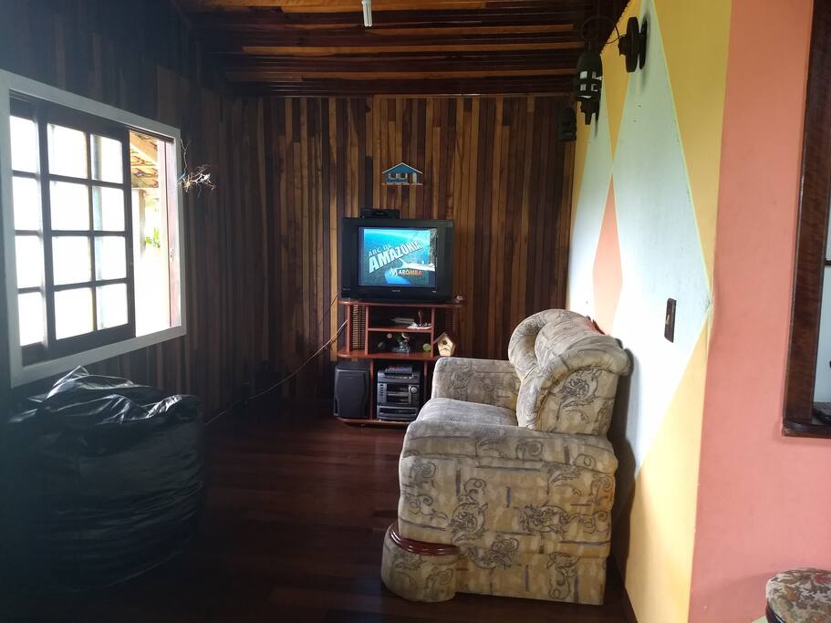 Sala de Tv com sofá , Puf