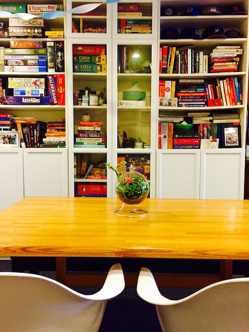 The table area is great for dining or setting up a work station. Plus, tons of books and board games for you to enjoy!