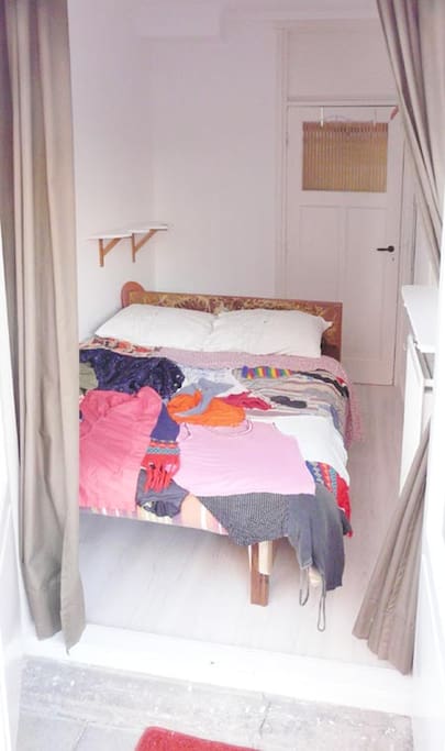 Double bed, here with an art-cover. We are artists and sculptors. So we built this bed. The mattress is 195 x 150 cm