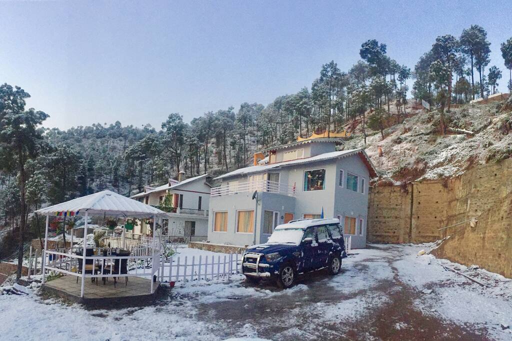The cottage decked in fresh snow