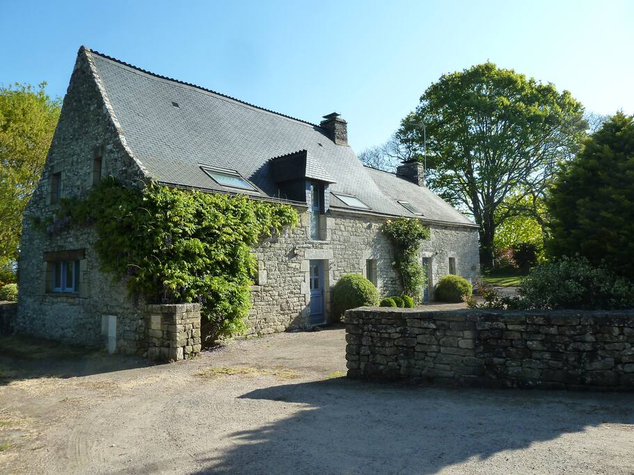 View of house with walled entry