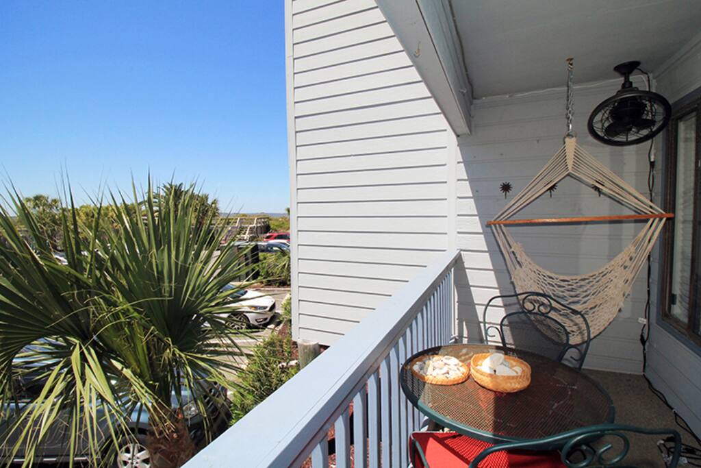 Enjoy watching dolphins in the river, shrimp boats & cargo ships entering & leaving the Port of Savannah from your Private Balcony