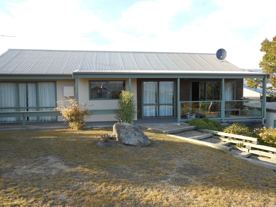 A front view. The house captures all day sun!