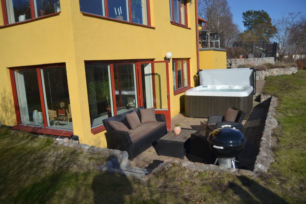 Privat patio with bbq, furniture and spa bath