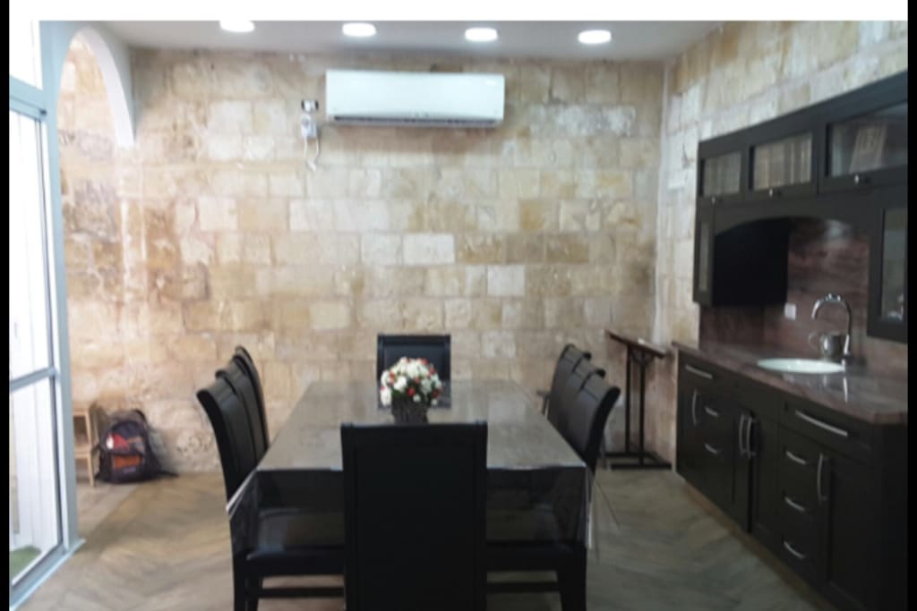 Table extends to 15 feet servicing 22-24 guests