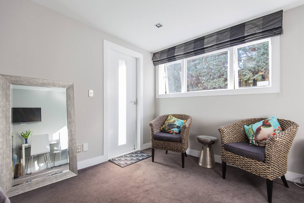 Aesthetically pleasing interior design, wicker furniture against bright white walls