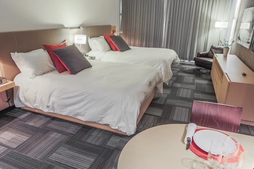 Relax and unwind in one of the comfortable queen beds.