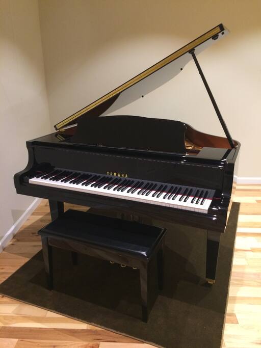 Yamaha baby grand piano.