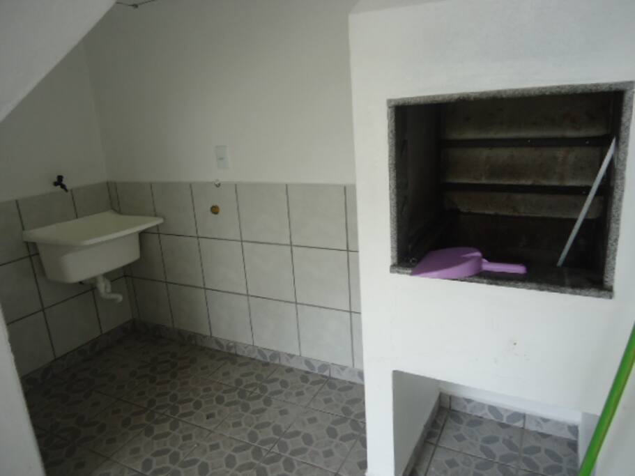 Espaço privativo para churrasco e lavanderia