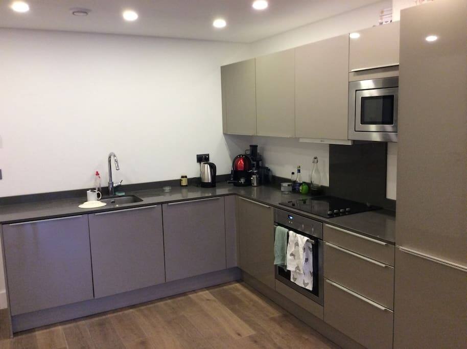 Kitchen with coffee machine