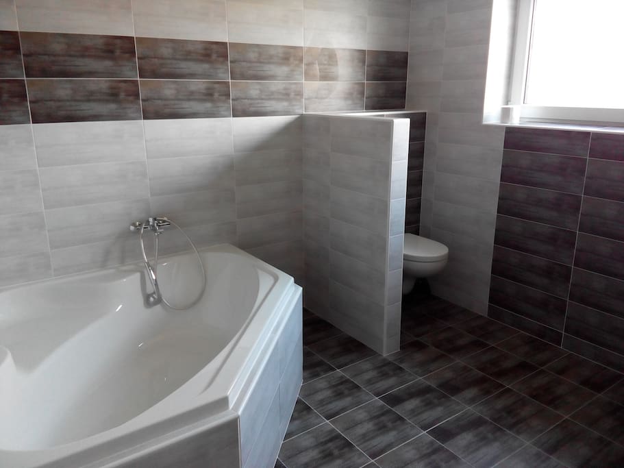 Bathroom with the bath and toilet