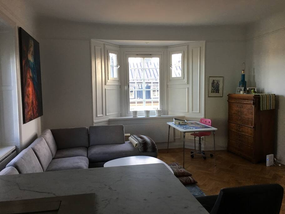 Top renovated top floor apartment floods with light all day. Open plan from new kitchen into this large living room.