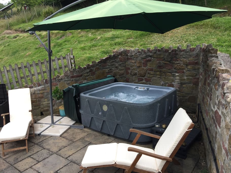 The Hot Tub patio - a sun trap and relaxing area.