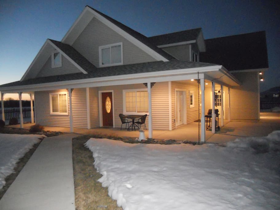 The wrap-around porch invites you to relax watching the sun rise or set.