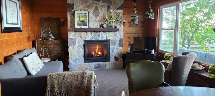 Gas fireplace in the livingroom for cooler nights. Large window over looks Lake Huron. See the beautiful sunsets from the comfort of the large deck outside the living room or from right inside.