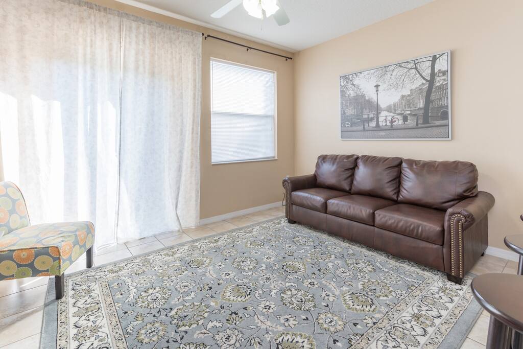 Head out back for some fresh air in the back patio (right behind the curtains)