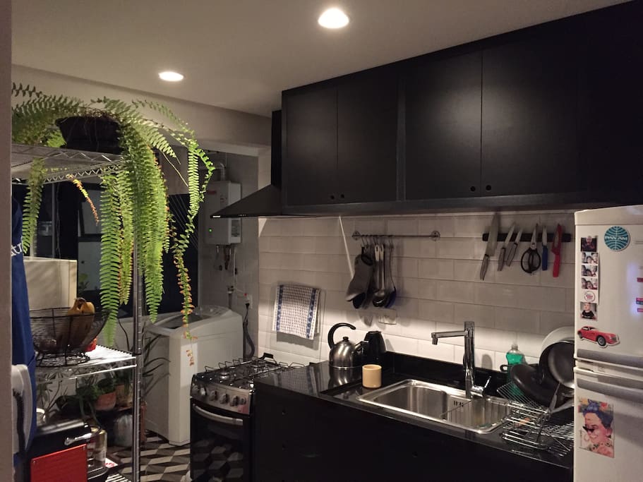 Cozinha com área ao fundo