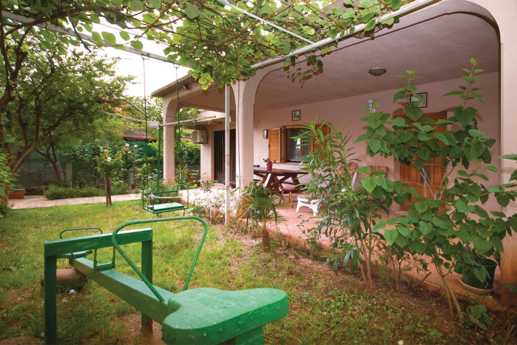 Terrace with swings