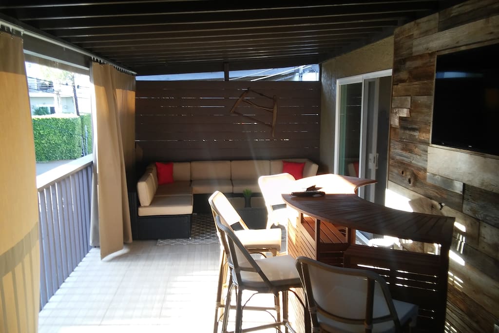Enclosed outdoor private patio
with Bar, TV, BBQ and Stove