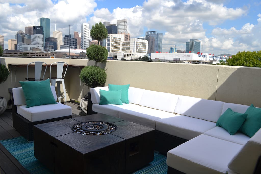 Amazing views of downtown! With outdoor TV and seating for 8.