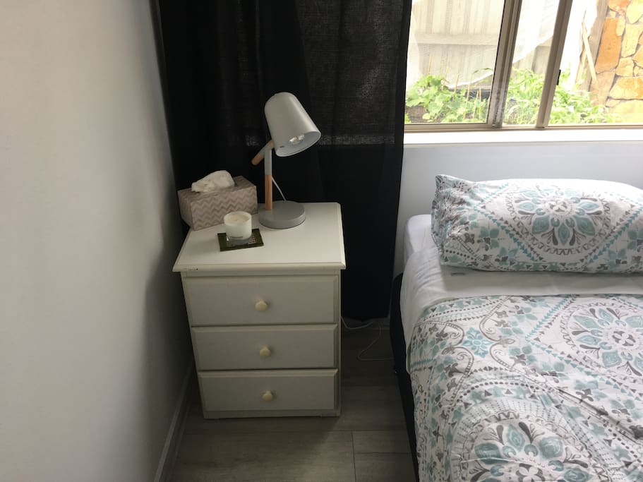 Bedside lamp and candle