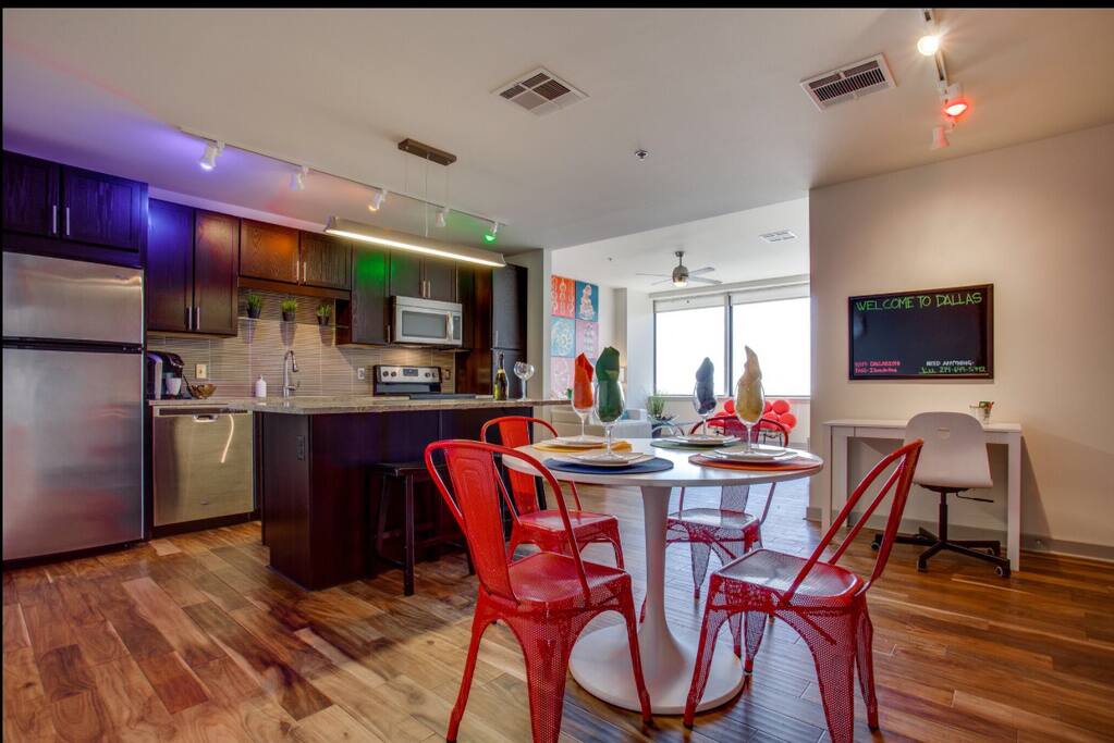 Spacious dining room, kitchen, and living area.