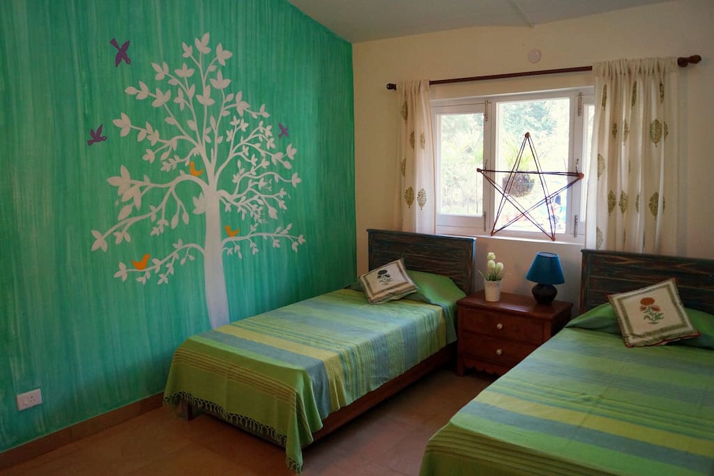 This is the second room that has two single beds. The beds can be also joined together if the guests so desire. This room can also be made into a cosy living room if a single guest or couple would like some additional space. pictures of this same room made into a living room are attached.