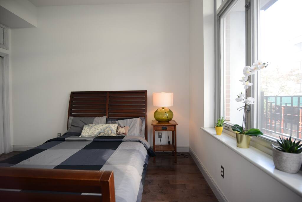 Bedroom 1 with Queen Bed and Balcony