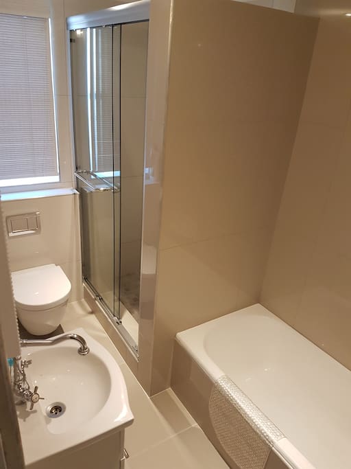 Full bathroom with shower and bath. Baby bath available on request