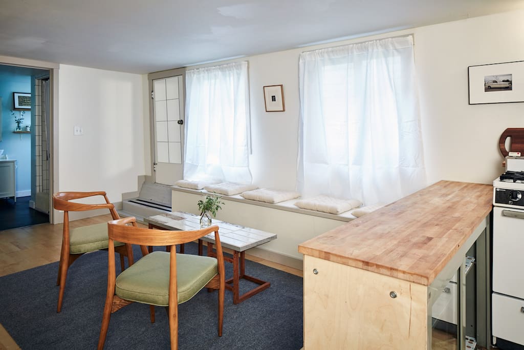 main sitting area, looking towards windows and private entrance