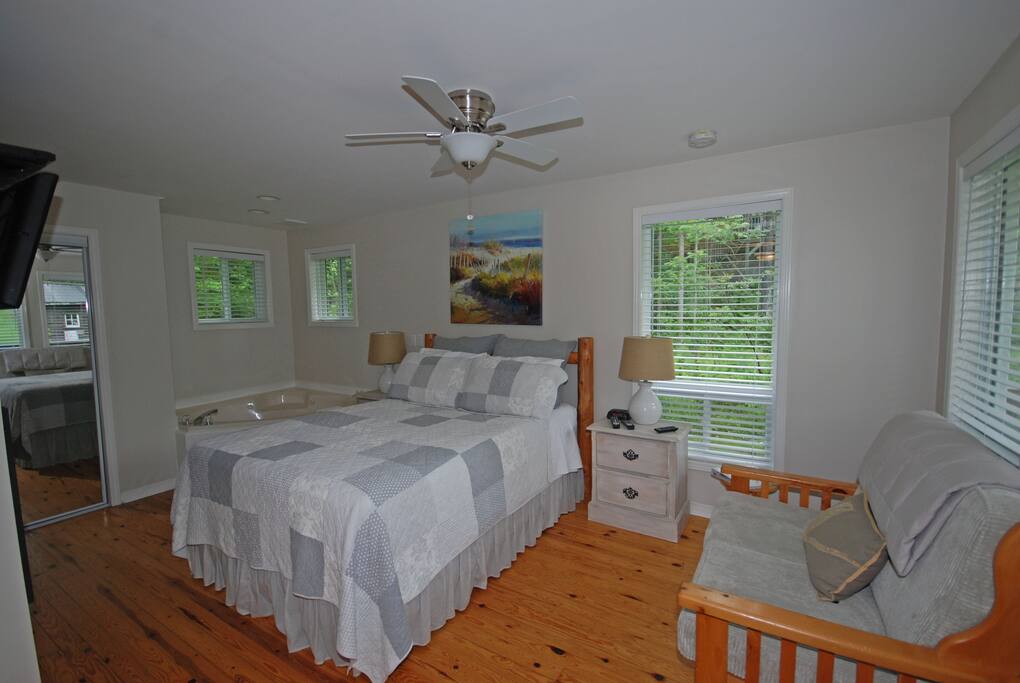 Sleeping Area showing Double Jacuzzi Tub