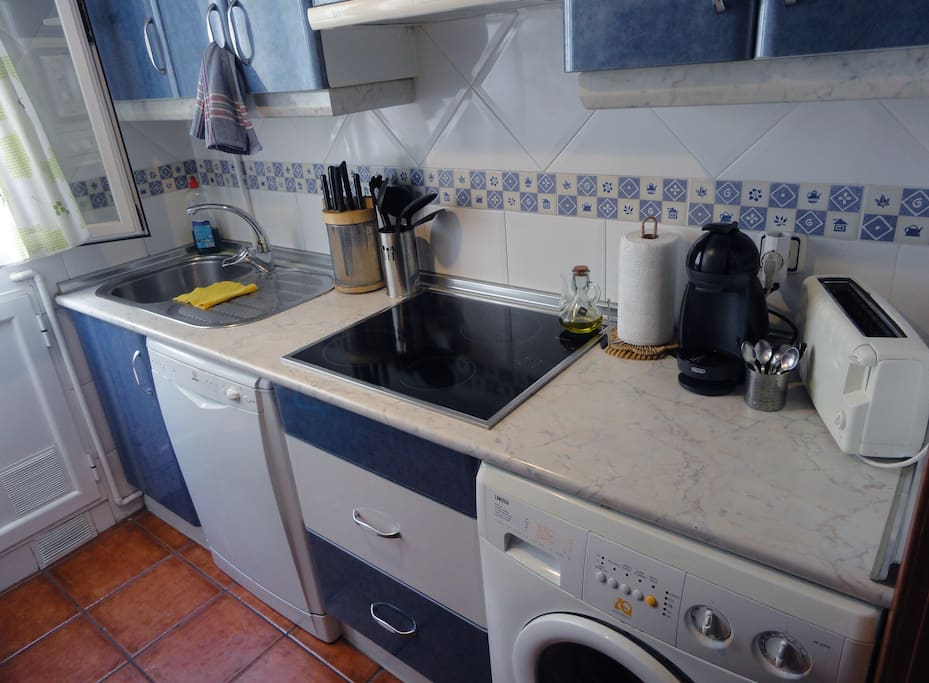 Access to KITCHEN equipped with Coffee Maker, Toaster, Electric Stove Top, Refrigerator, Microwave Oven, Dishes, Pots and Pans and lots of natural light