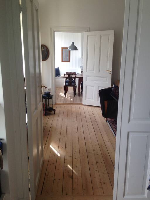 View from bedroom thru livingroom to kitchen