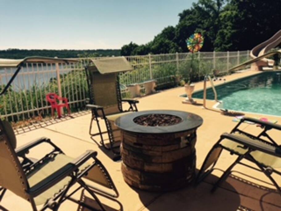Relax at night by the pool and enjoy the fire pit!