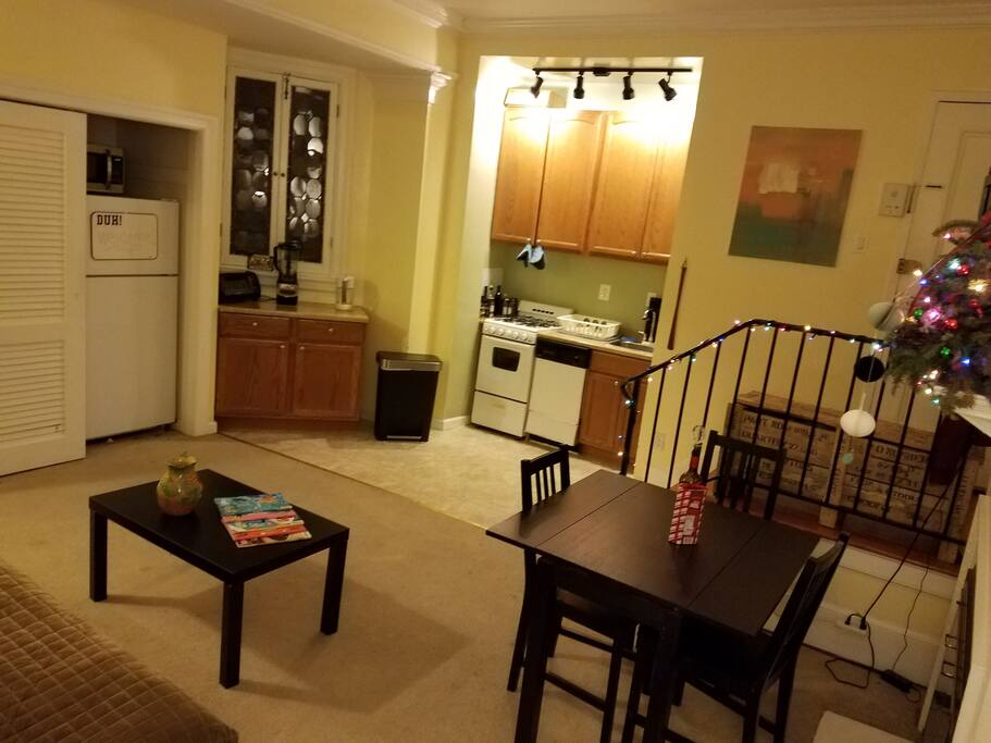 Living Room with view of kitchen and fridge