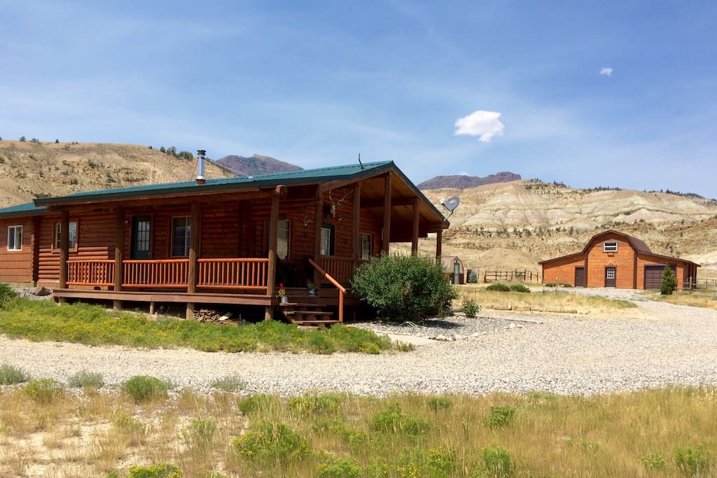 The main cabin you see in front has 2 bedrooms, a full kitchen, 2 bathrooms, and a cozy living room.