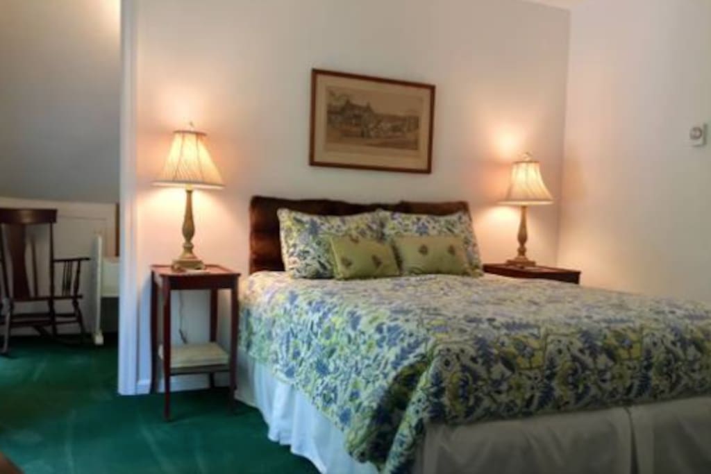 queen bed with nursery on 2nd floor