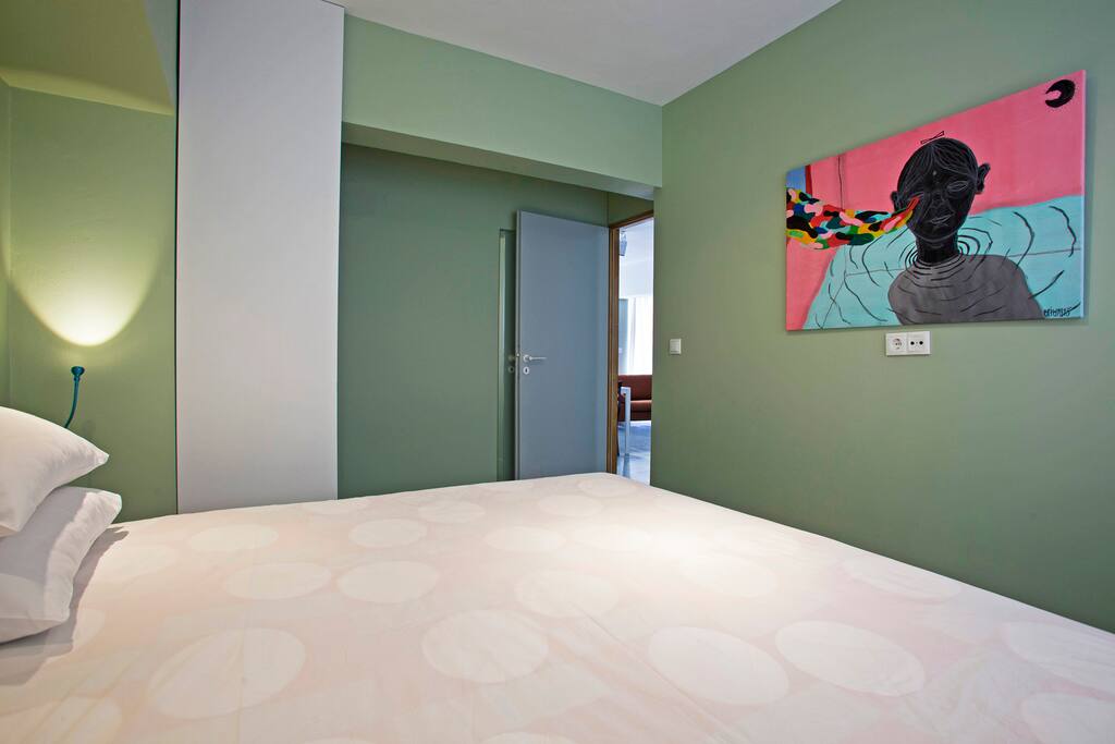 Main bedroom with art work.