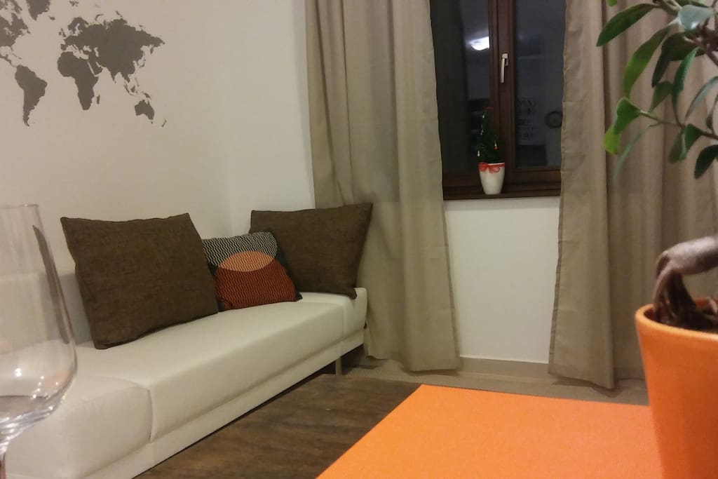Ground floor with a closed sofa.