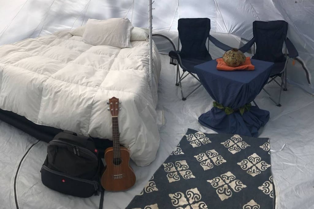 A typical setup inside of our bell tents. Parties of 2+ will have an additional queen bed.