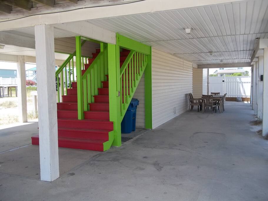 Storage area underneath for beach toys. Grill and seating outside by pool door!